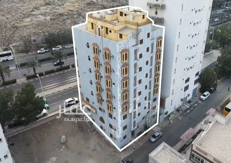 عمارة 405 م² في العزيزية 2