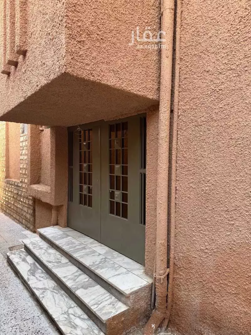 عمارة 452 م² في الديرة 21